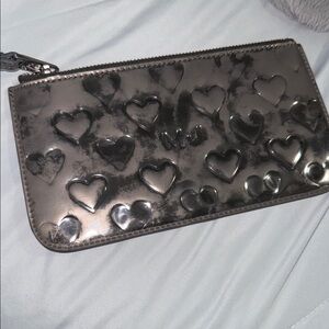 Marc Jacob’s Silver Heart Embossed Clutch